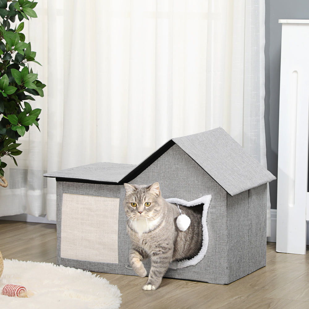 Cat house with soft cushion, scratching post, hanging ball and double entrance, grey.