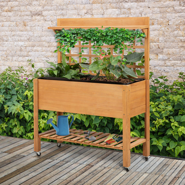 Raised wooden planter with shelf and casters