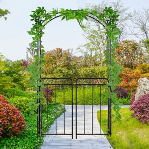 Metal garden arch with scrollwork doors
