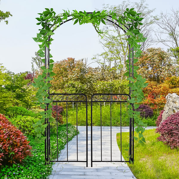 Metal garden arch with scrollwork doors