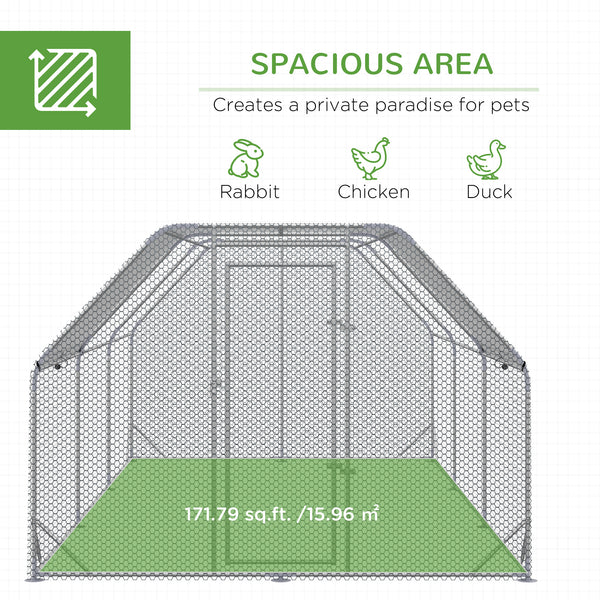 Large galvanized metal chicken coop with flat roof and tarp