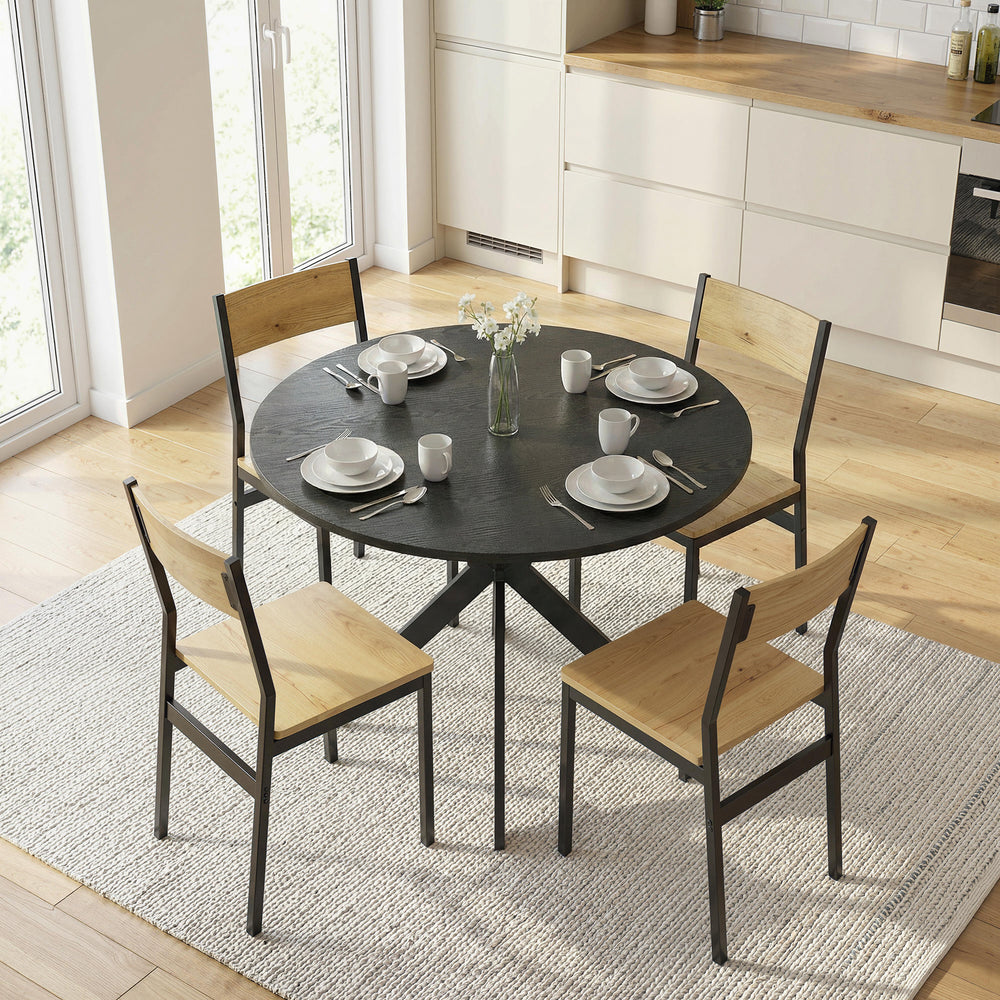Contemporary round dining table with steel legs, black wood look