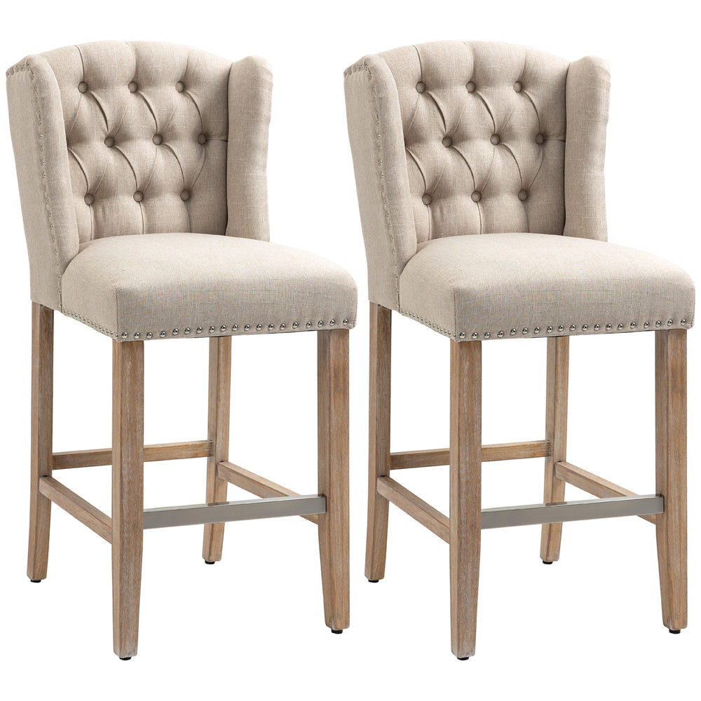 Set of 2 padded bar stools with studded backrest and footrest, beige