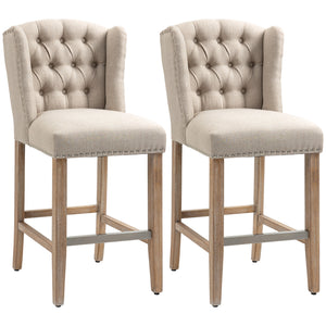 Set of 2 padded bar stools with studded backrest and footrest, beige