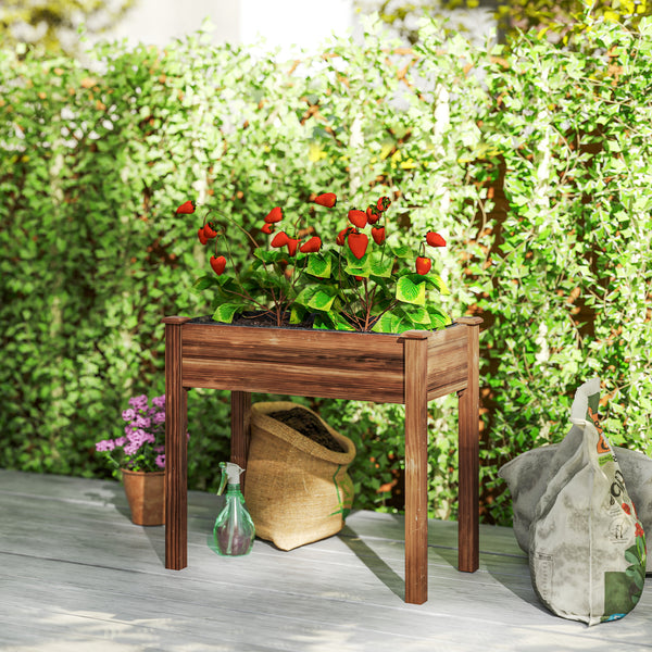 Raised wooden planter with legs