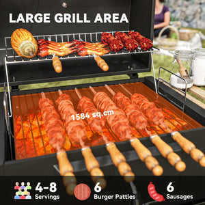 Charcoal barbecue on wheels with adjustable charcoal tray