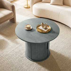 Round coffee table with fluted base and hidden sliding door storage – Cement gray