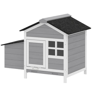 Wooden chicken coop with nesting box and removable metal tray