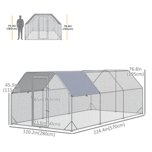 Large galvanized metal chicken coop with flat roof and tarp