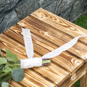 Outdoor garden bench made of carbonized fir wood