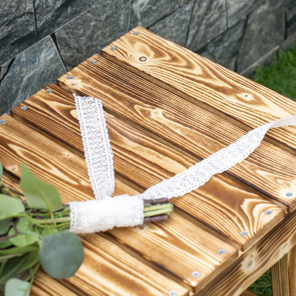 Outdoor garden bench made of carbonized fir wood