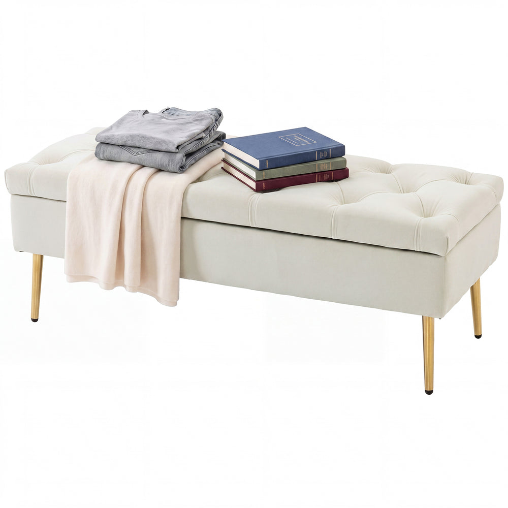 Tufted bedroom bench with gold metal legs and thick padding, beige