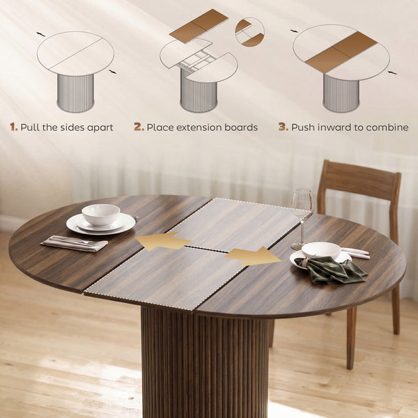 Extendable kitchen table for 6 to 8 people, farmhouse style, with a central pedestal and a walnut finish.