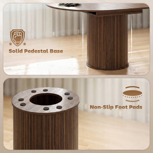 Extendable kitchen table for 6 to 8 people, farmhouse style, with a central pedestal and a walnut finish.