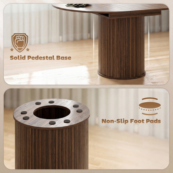 Extendable kitchen table for 6 to 8 people, farmhouse style, with a central pedestal and a walnut finish.