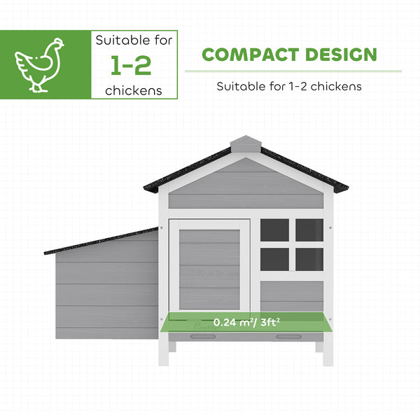 Wooden chicken coop with nesting box and removable metal tray