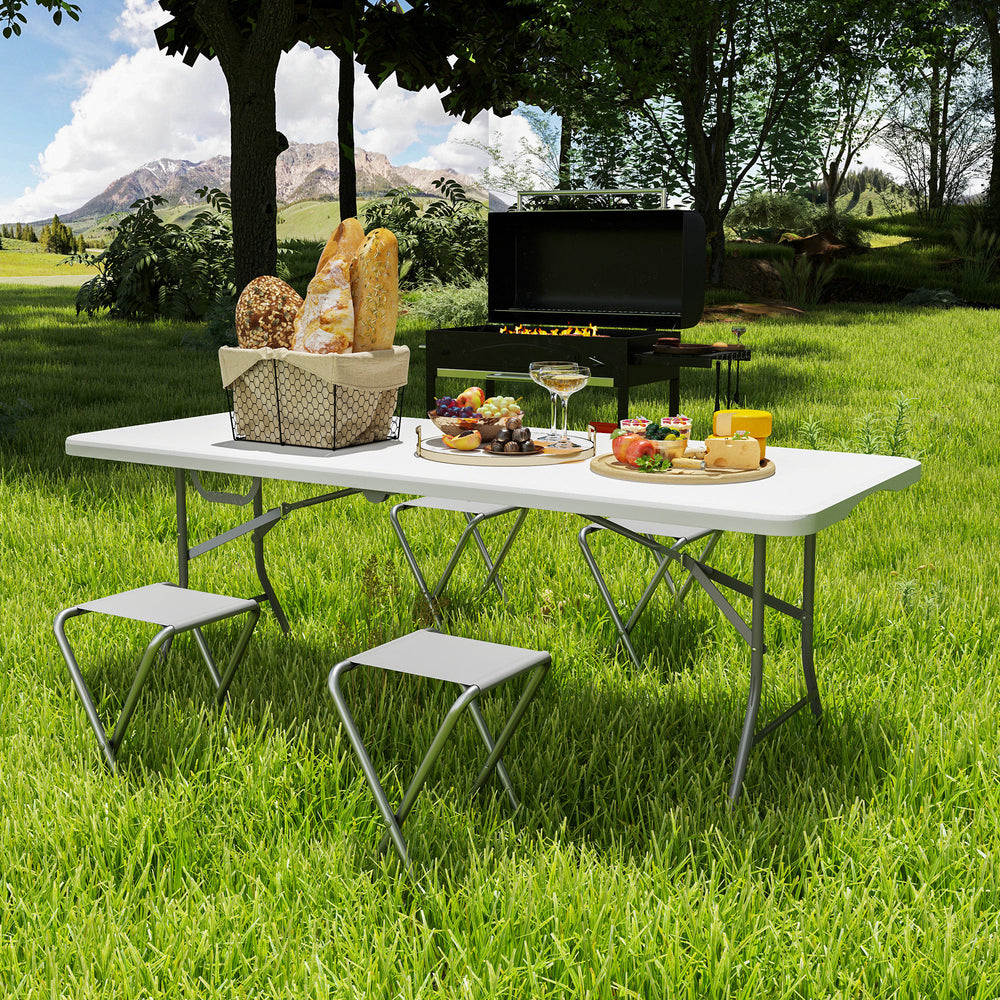 Portable folding plastic table with carrying handle