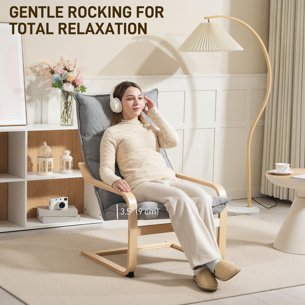 Modern upholstered armchair with curved legs and armrests, light grey