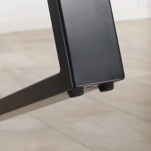 Industrial style dining table with wavy edge top and steel legs, rustic brown