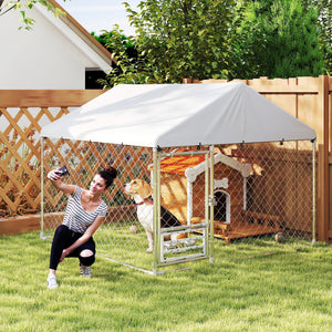 Outdoor dog kennel with adjustable and rotating bowls