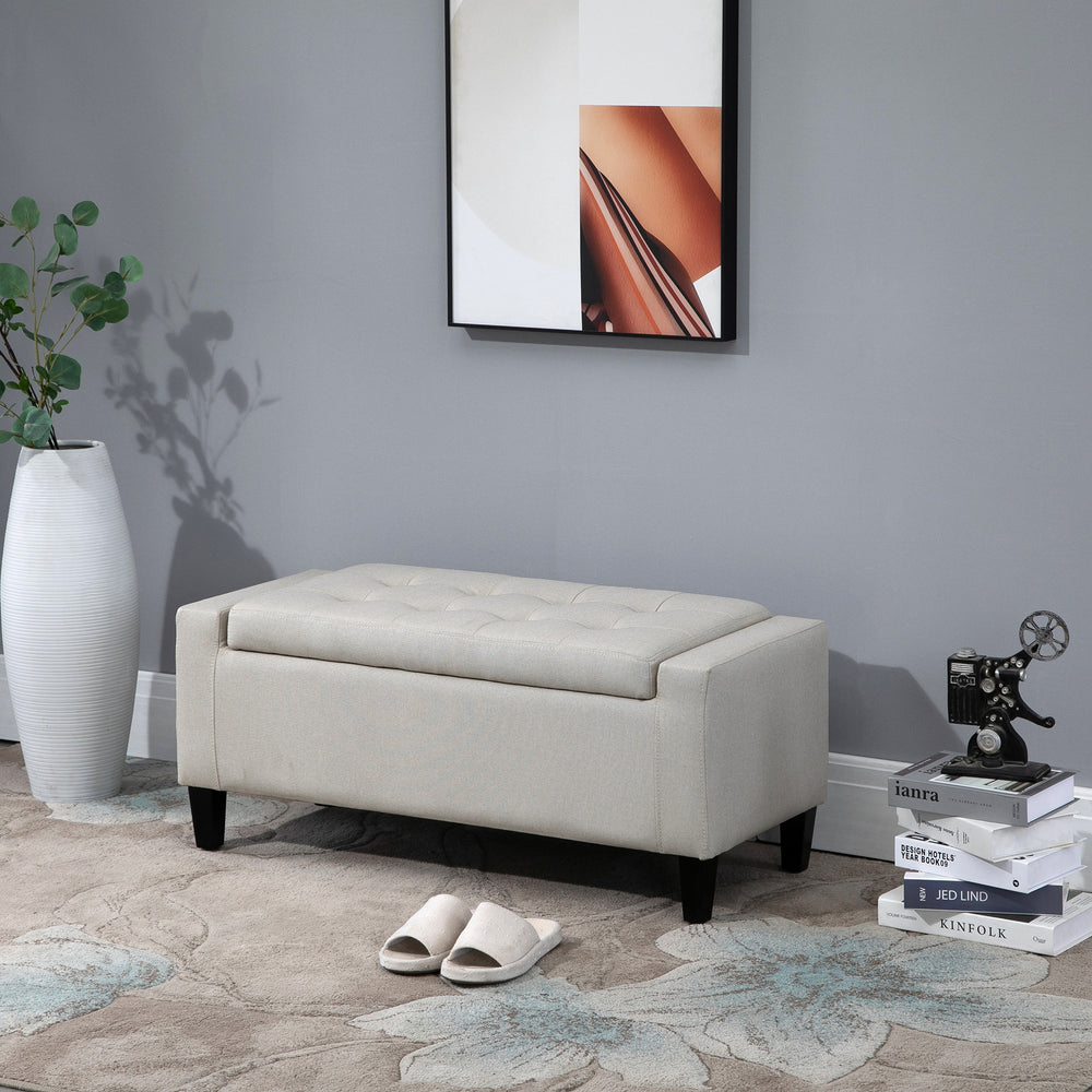 Upholstered storage ottoman bench in linen-feel fabric with folding top, beige