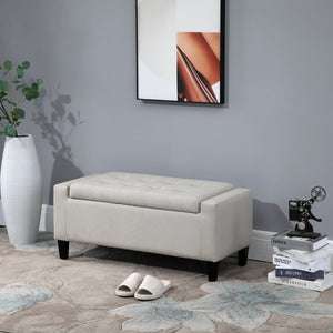Upholstered storage ottoman bench in linen-feel fabric with folding top, beige