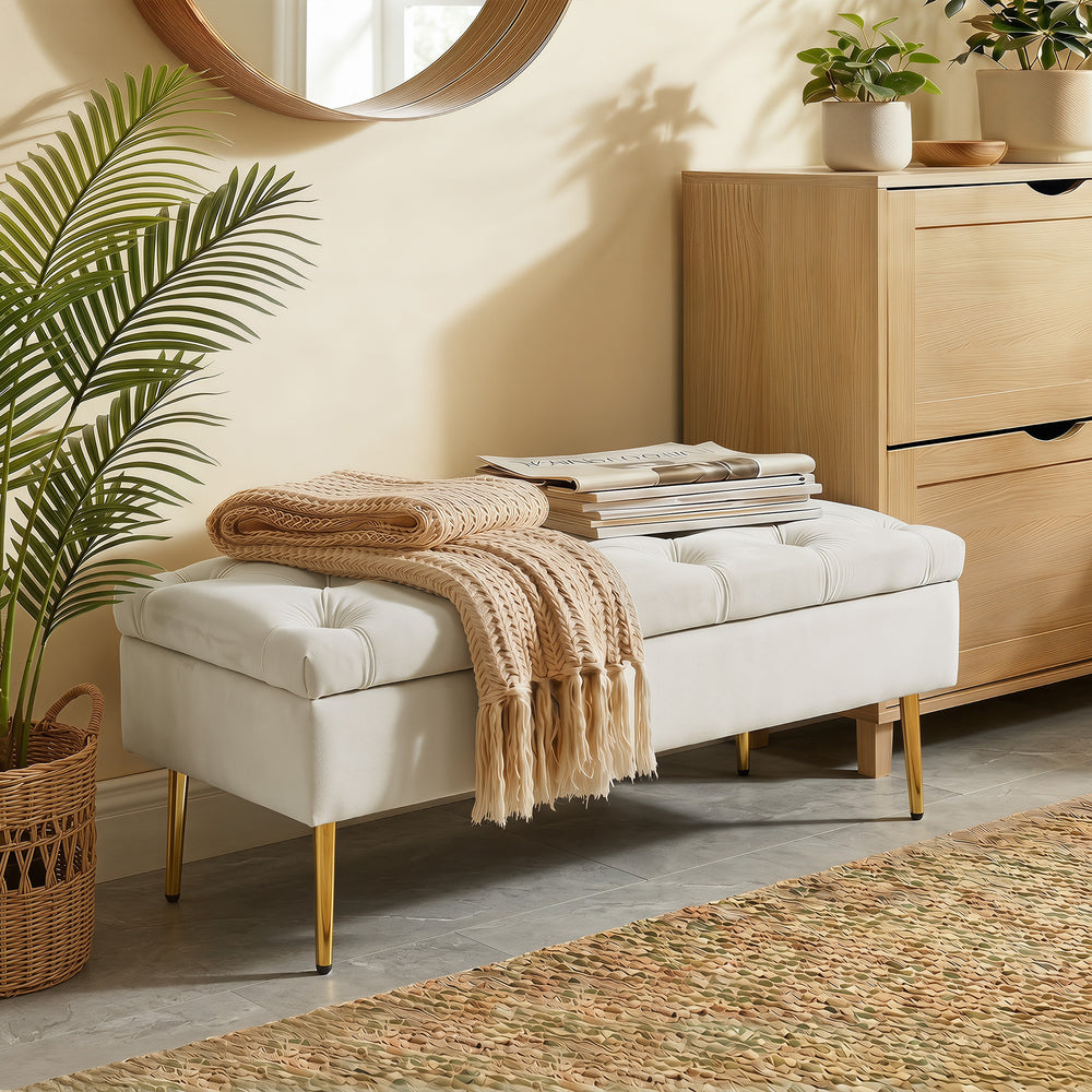 Tufted bedroom bench with gold metal legs and thick padding, beige