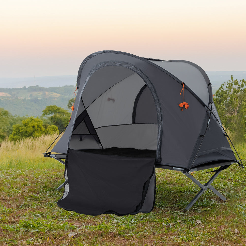 Folding camp bed with self-inflating air mattress and carrying bag