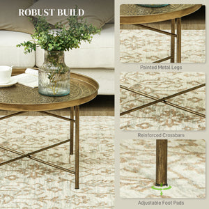 Vintage round coffee table with hammered top and metal frame, gold