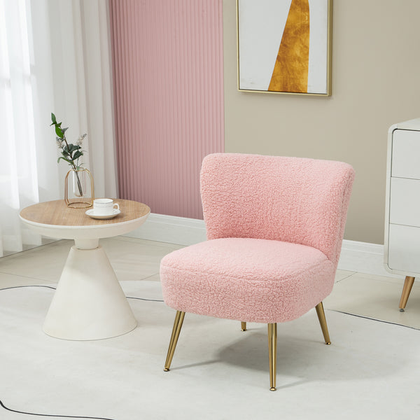 Living room armchair with soft padding and gold legs, pink