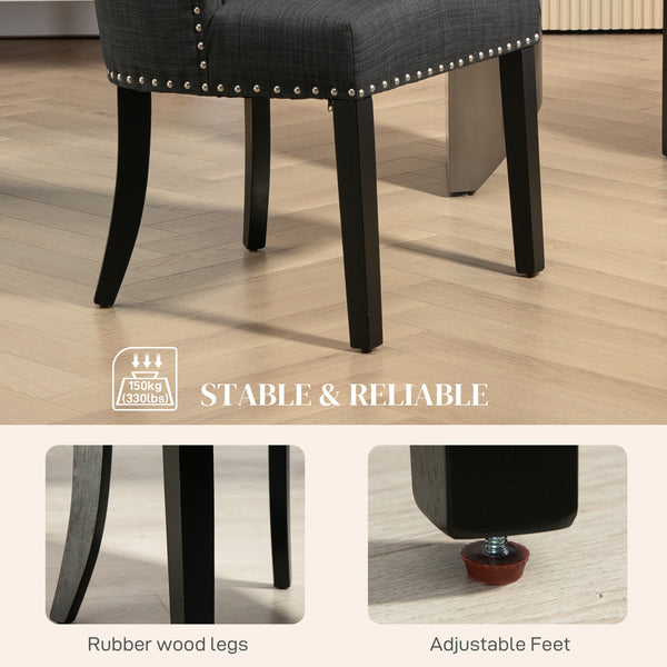 Set of 2 linen dining chairs with studded trim and wooden legs, dark grey