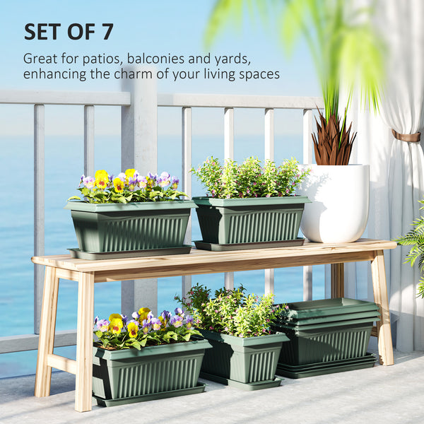 Set of 7 plastic flower pots with drainage holes and saucers