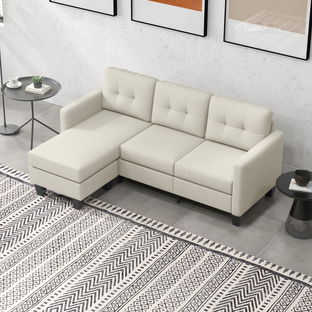 Canapé d’angle en L 3 places beige avec pouf, coussin épais et pieds en bois – mobilier confortable pour salon moderne