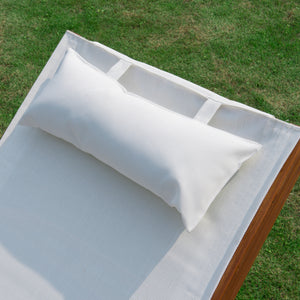 Wooden outdoor reclining lounge chair with headrest and mesh seat, cream.