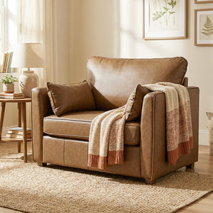 Faux leather accent chair with wide seat, spring cushion, rubberwood legs, 2 cushions, brown