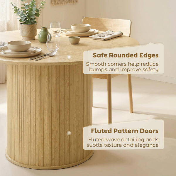 Round dining table for 5 people with a fluted central pedestal base, natural color.