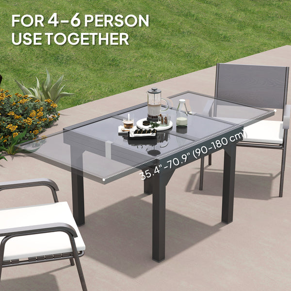 Extendable outdoor table with tempered glass top and metal frame