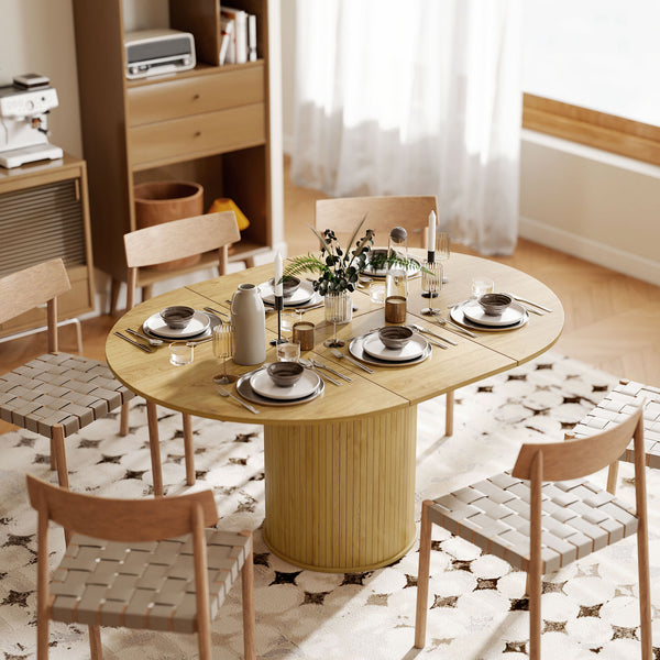 Extendable kitchen table for 6 to 8 people in country style with pedestal base, natural wood finish