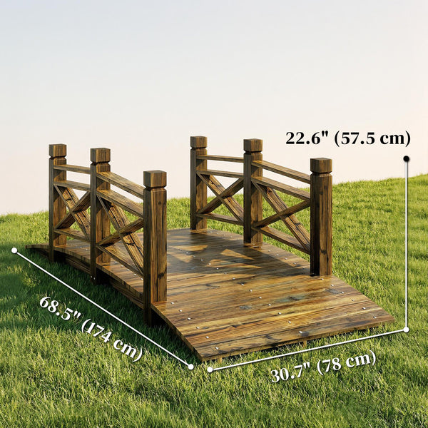Charred wooden arch bridge with safety railings