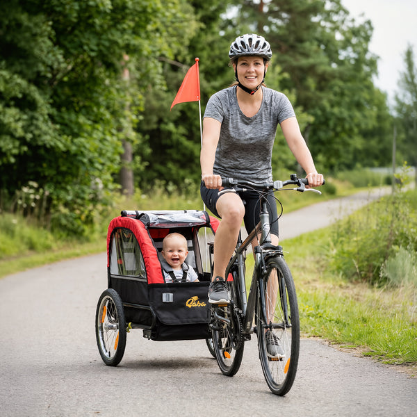 Child bike trailer with 5-point harness, 16-inch rubber wheels, storage bag, from 18 months, red.
