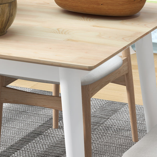 Country-style dining table with a pine frame and natural color.