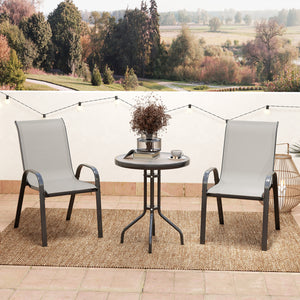 Ensemble bistrot 3 pièces gris clair avec chaises empilables en maille et table en verre, parfait pour jardin ou balcon
