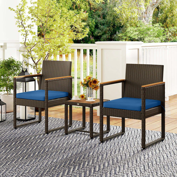 Ensemble bistrot en rotin bleu foncé avec table en bois d'acacia et coussins amovibles, idéal pour terrasse