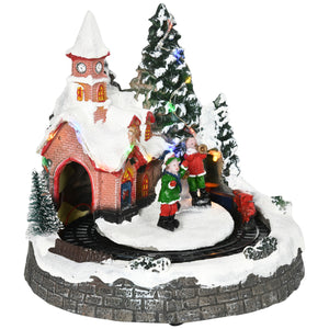 Christmas houses with multi-colored rotating train