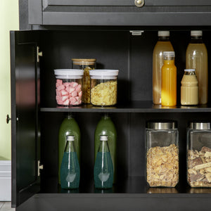 Modern sideboard with 2 drawers and adjustable shelves, black.