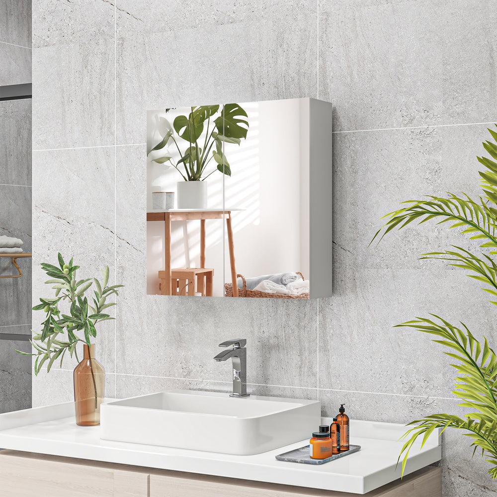 Wall-mounted medicine cabinet with mirrored doors, adjustable shelves, and soft-close mechanism, glossy white