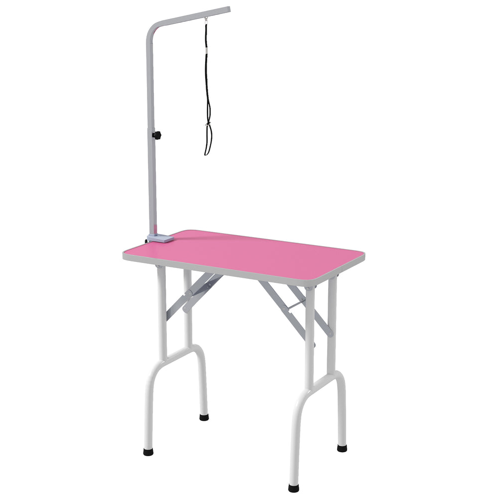 Folding grooming table with adjustable arm and non-slip surface, pink