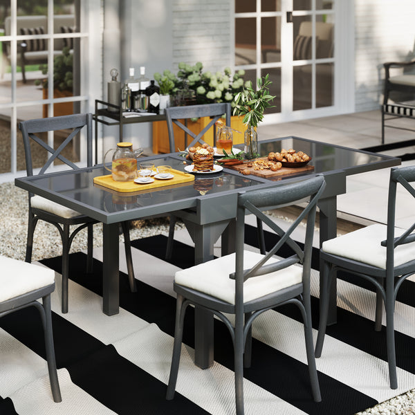 Extendable outdoor table with tempered glass top and metal frame