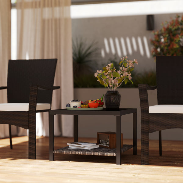Outdoor coffee table with tempered glass top and storage shelf, black