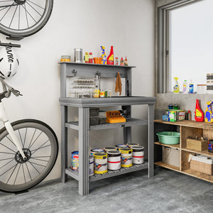 Outdoor potting table with tap, removable sink, hooks and storage shelves
